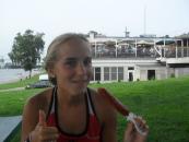 Sarah eating a Pronto Pup.