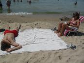 Me sleeping in the sun and getting burnt to a crisp.