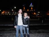 In front of a lit-up church in Baños
